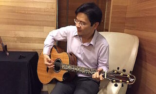 Singapore's future Prime Minister on the guitar (Image: Facebook)