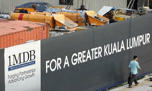 1MDB-Plakat in Kuala Lumpur (Bild: Keystone)