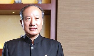 Co-Founder and Chairman of HNA Group